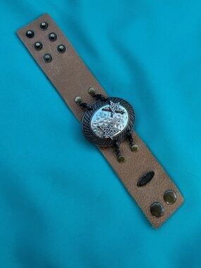 Plunder wide leather brown bracelet.